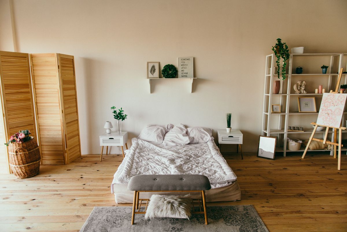Interior designer reviewing samples and plans to win design clients online